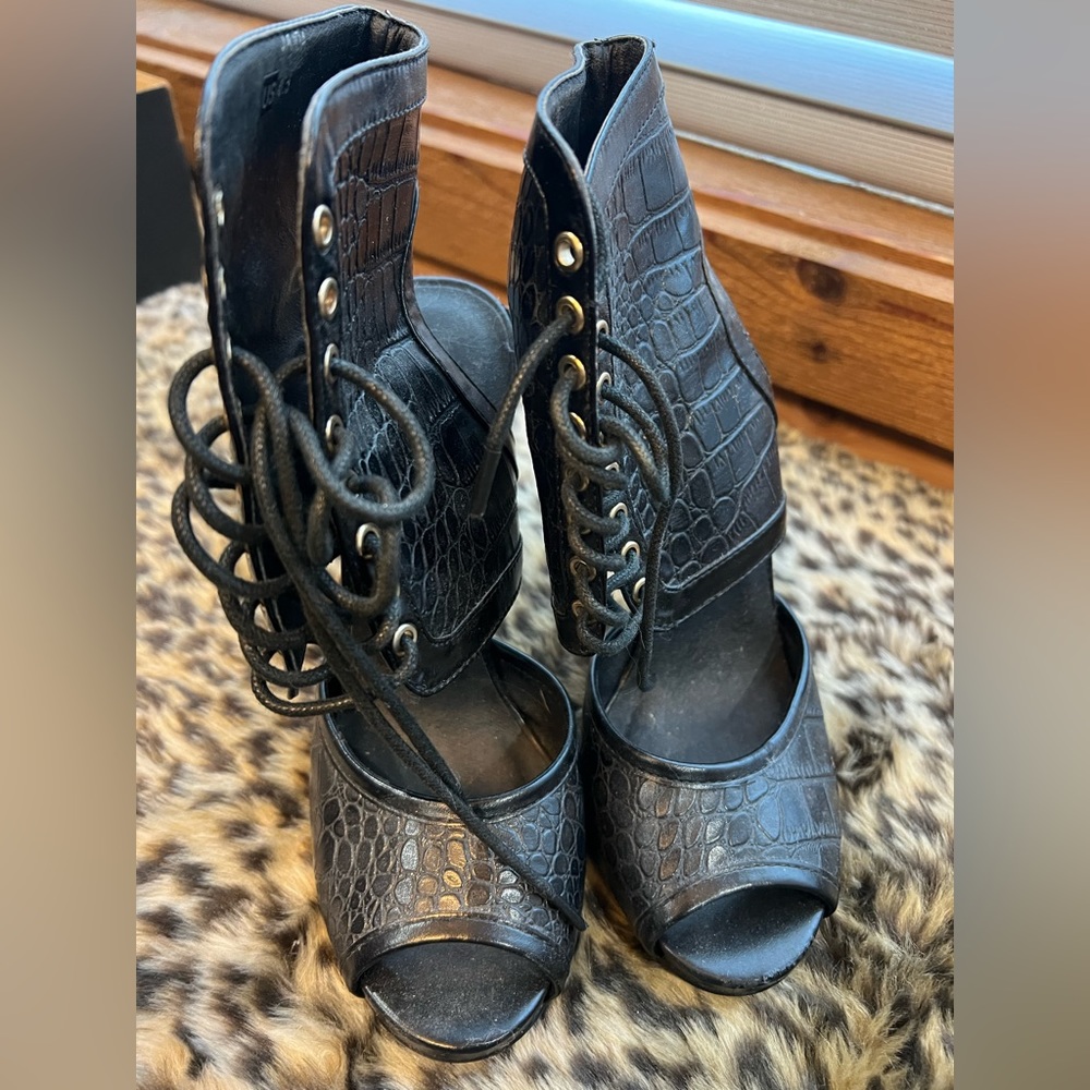 Black lace up high ankle heels, worn one time